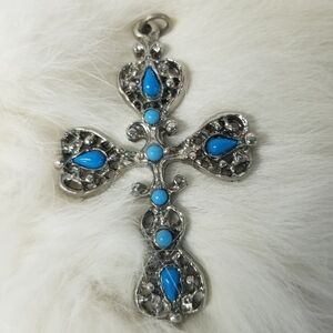 Faux turquoise and silvertone cross pendant
